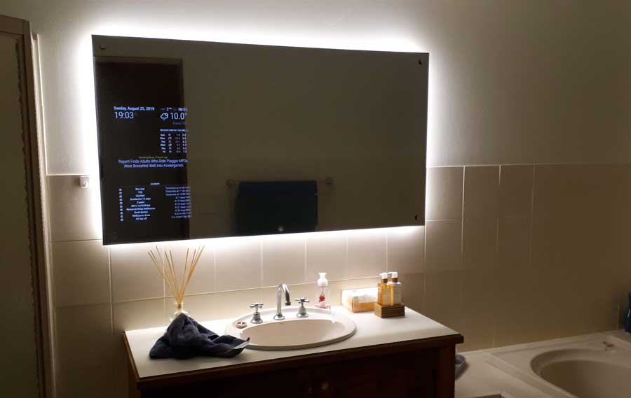 Large smart mirror with LEDs in bathroom