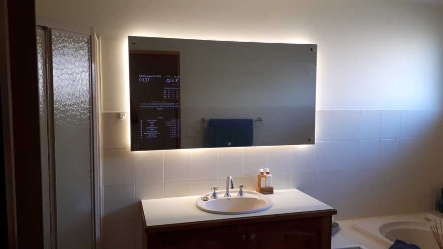 Large smart mirror in bathroom